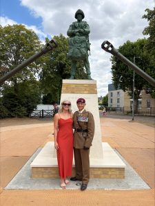 Charlotte Knappett and Major Curt Vines (Retired) in front of the newly unveiled Cplchester Airborne Statue – 5 8 26_